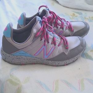 New Balance Size 6 never worn. Gray with pink & baby blue